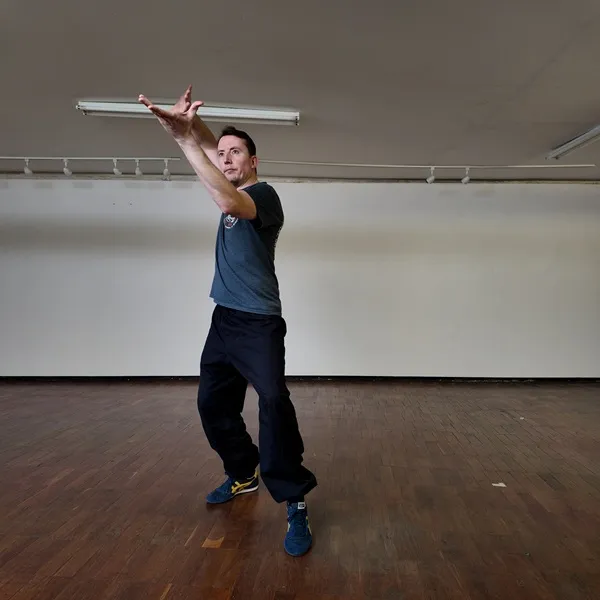 Ollie Smith demonstrating Swallow Overturning, Covering Hand Palm