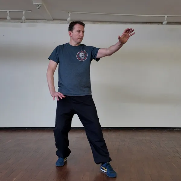 Practitioner in Baguazhang starting posture at The Moral Dragon, Bath